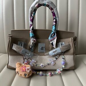 Stylish Brown and Tan Handbag with Scarf and Beaded Charm